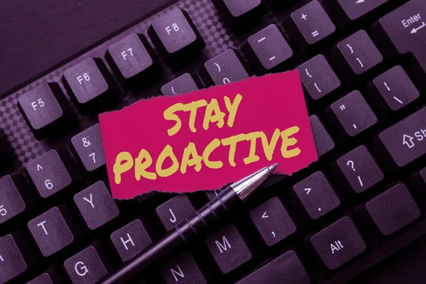 Text sign showing Stay Proactive. Business overview Taking own decision to go ahead of anticipated events Transferring Written Notes To A Computer, Typing Motivational Messages — Foto Stock