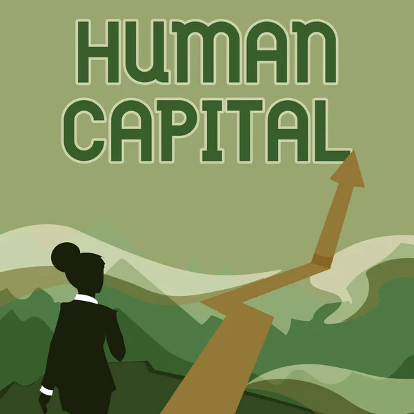 Conceptual caption Human Capital. Internet Concept Intangible Collective Resources Competence Capital Education Lady Walking Towards Mountains With An Arrow Marking Success — Stockfoto