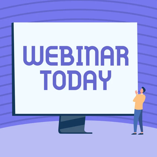 Hand writing sign Webinar Today. Conceptual photo live online educational presentation on different location Man Standing Drawing Looking At Large Monitor Display Showing News. — Stockfoto