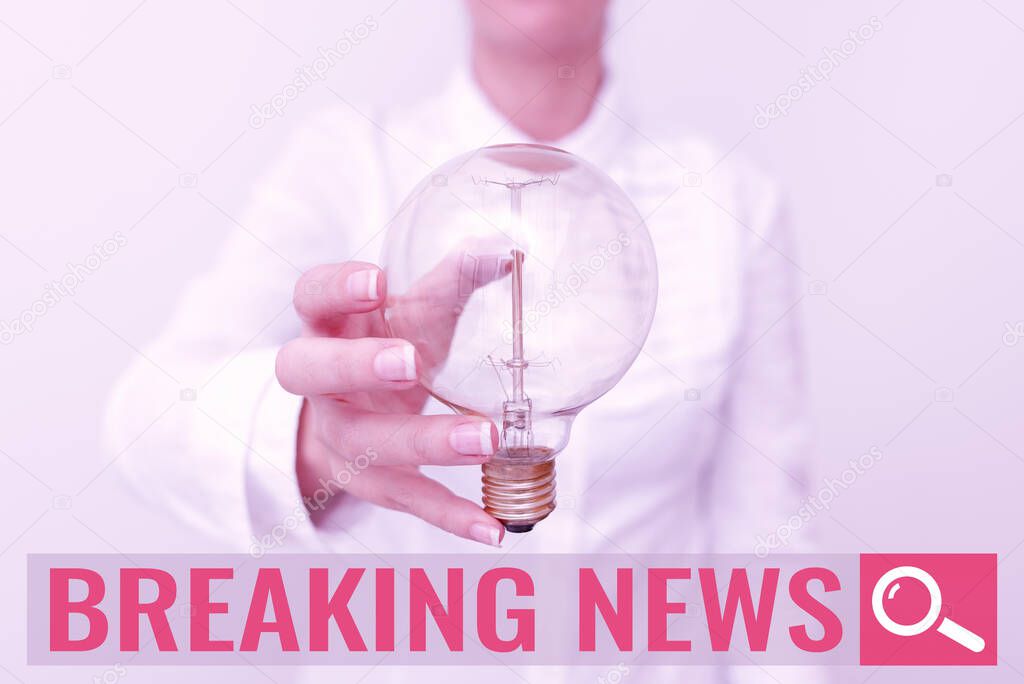Text caption presenting Breaking News. Word for Special Report Announcement Happening Current Issue Flashnews Lady in business outfit holding lamp presenting new technology ideas