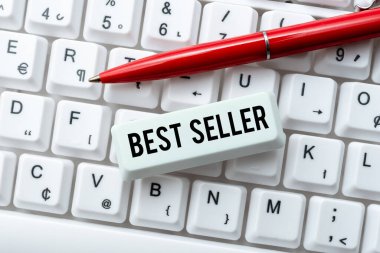 Metin başlığı En Çok Satanlar 'ı sunar. Kavramsal fotoğraf büyük miktarlarda üretilen yüksek fiyatlı bir ürün Daktilo Aygıtı Kullanım Kılavuzu, Posta Ürünleri İncelemesi Çevrimiçi