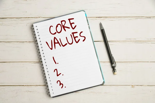 Conceptual display Core Values. Conceptual photo principles which guide and determine what is wrong and right Keyboard Over A Table Beside A Notebook And Pens With Sticky Notes — Stockfoto