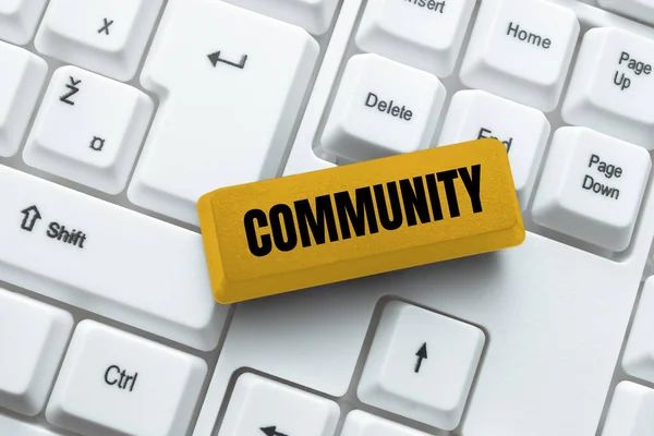 Tekenen tonen Community. Word Written on specific population with a common characteristics living together Typing Employment Agreement Sample, Transcribing Online Talk Show Audio — Stockfoto