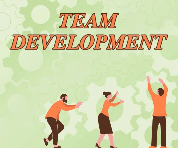 Text caption presenting Team Development. Business approach learn why and how small groups change over time with graphs Colleagues Carrying Cogwheels Arranging New Workflow Achieving Teamwork. — Stock Photo, Image