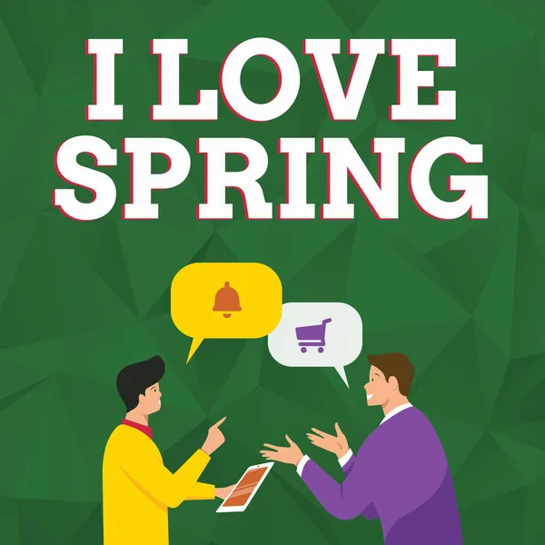 Znak tekstowy pokazujący Kocham Wiosnę. Słowo Wpisany na uczucia na sezon roku, gdzie istnieje wiele kwiatów Dwóch kolegów stojących dzieląc myśli razem z bańki mowy — Zdjęcie stockowe