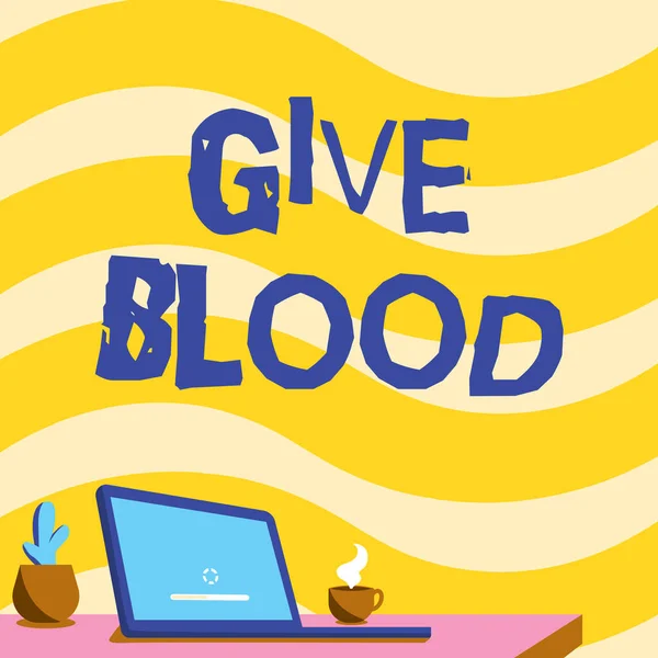 Exibição conceitual Give Blood. Conceito que significa pessoa voluntariamente tem sangue retirado e usado para transfusões Office Desk Desenho com Laptop Pen Holder e um aberto e arranjado — Fotografia de Stock