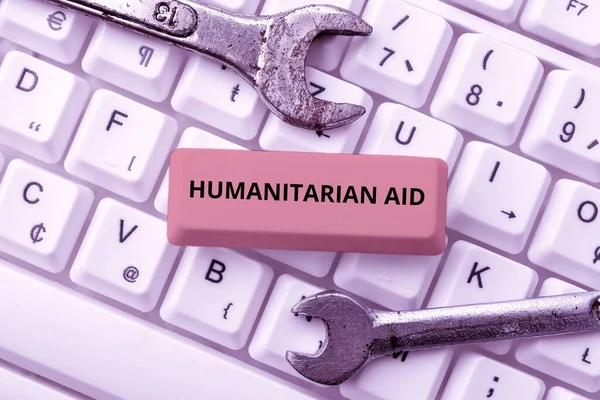 Handstilstext Humanitärt bistånd. Ord för omedelbar hjälp efter naturkatastrofer och katastrofer orsakade av människor Sammanfattning Fixa föråldrade webbplatser, upprätthålla Internetanslutning — Stockfoto