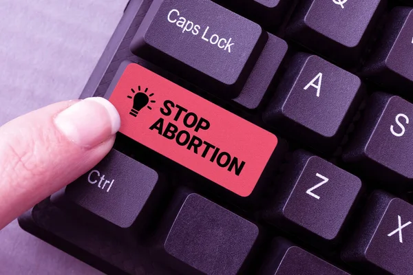 Szöveg megjelenítése Stop Abortusz. Üzleti megközelítés, amely az abortusz gyakorlata ellen foglal állást Prolife mozgalom Online fájlok és adatok letöltése, Programozási kódok feltöltése — Stock Fotó