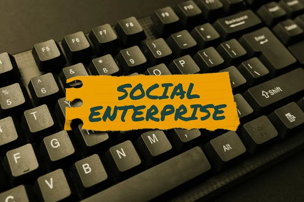 Writing displaying text Social Enterprise. Conceptual photo It is a business that has specific civil objectives Typing New Edition Of Informational Ebook, Creating Fresh Website Content — Stock Photo, Image