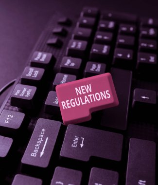 Yeni Yönetmelikleri gösteren bir işaret. Bir hükümet veya otorite tarafından yazım ürünü başlığı ve tanımlamalarını kontrol etmek, önemli veri kodlarına girmek için yapılan İnternet Kavramı kuralları