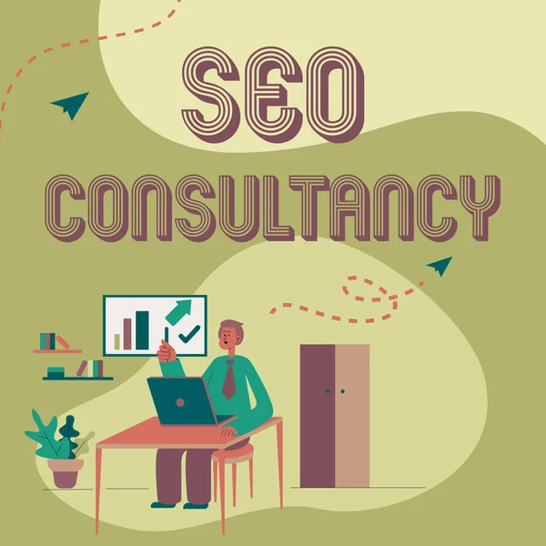 Skriv under på Seo Consultancy. Word för specialiserat sig på att utvärdera en organisation s är webbplats Man Sitter på skrivbordet Arbete och presentera ny teknik. — Stockfoto