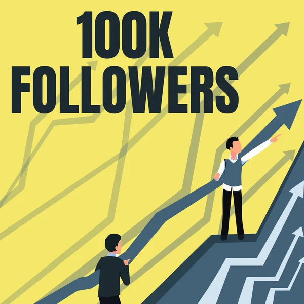 Hand writing sign 100K Followers. Concept meaning number of individuals who follows someone in Instagram Arrows Guiding Two Collaborating Businessmen Towards Better Financial Plan. — Stock Photo, Image