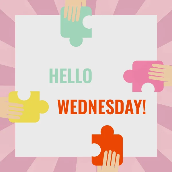Text showing inspiration Hello Wednesday. Business approach it is a good day when you reach in the middle of the week Illustration Of Hands Holding Puzzle Pieces Each Sides Of Box.