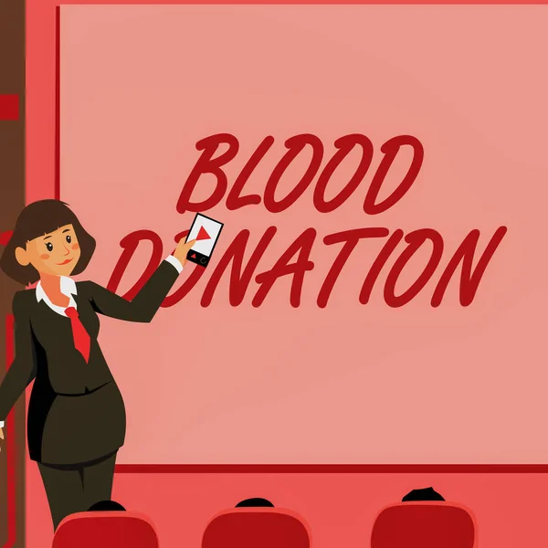 Znak tekstowy pokazujący krwiodawstwo. Koncepcja biznesowa Proces zbierania i przechowywania pełnej krwi Kobieta trzymająca zdalne sterowanie Prezentacja najnowszych pomysłów na tle ekranu. — Zdjęcie stockowe