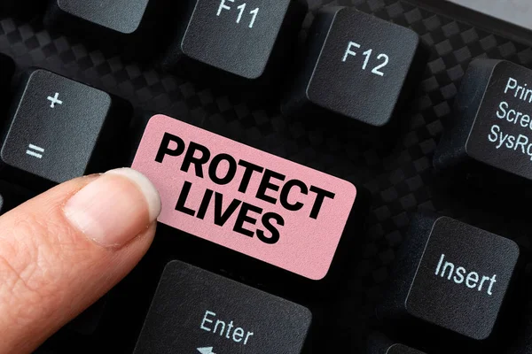 Text caption presenting Protect Lives. Business concept to cover or shield from exposure injury damage or destruction Abstract Creating Online Transcription Jobs, Typing Website Descriptions