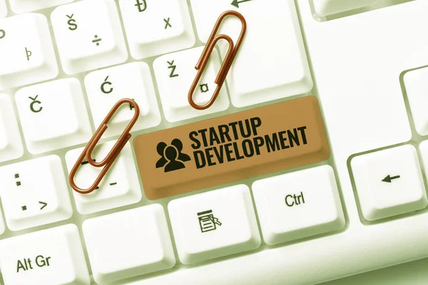 Sign displaying Startup Development. Conceptual photo efficiently develop and validate scalable business model Transcribing Internet Meeting Audio Record, New Transcription Methods — Stock Photo, Image