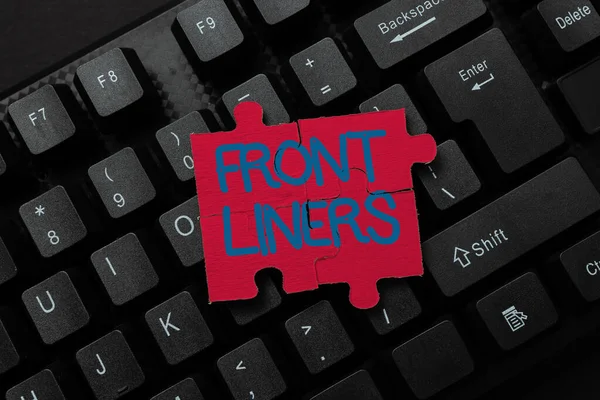 Writing displaying text Frontliners. Business idea most important or influential position in a debate or movement. Transferring Written Notes To A Computer, Typing Motivational Messages — Stock Photo, Image