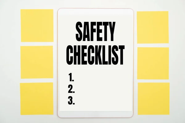 Text showing inspiration Safety Checklist. Business overview list of items you need to verify, check or inspect Office Supplies Over Desk With Keyboard And Glasses And Coffee Cup For Working