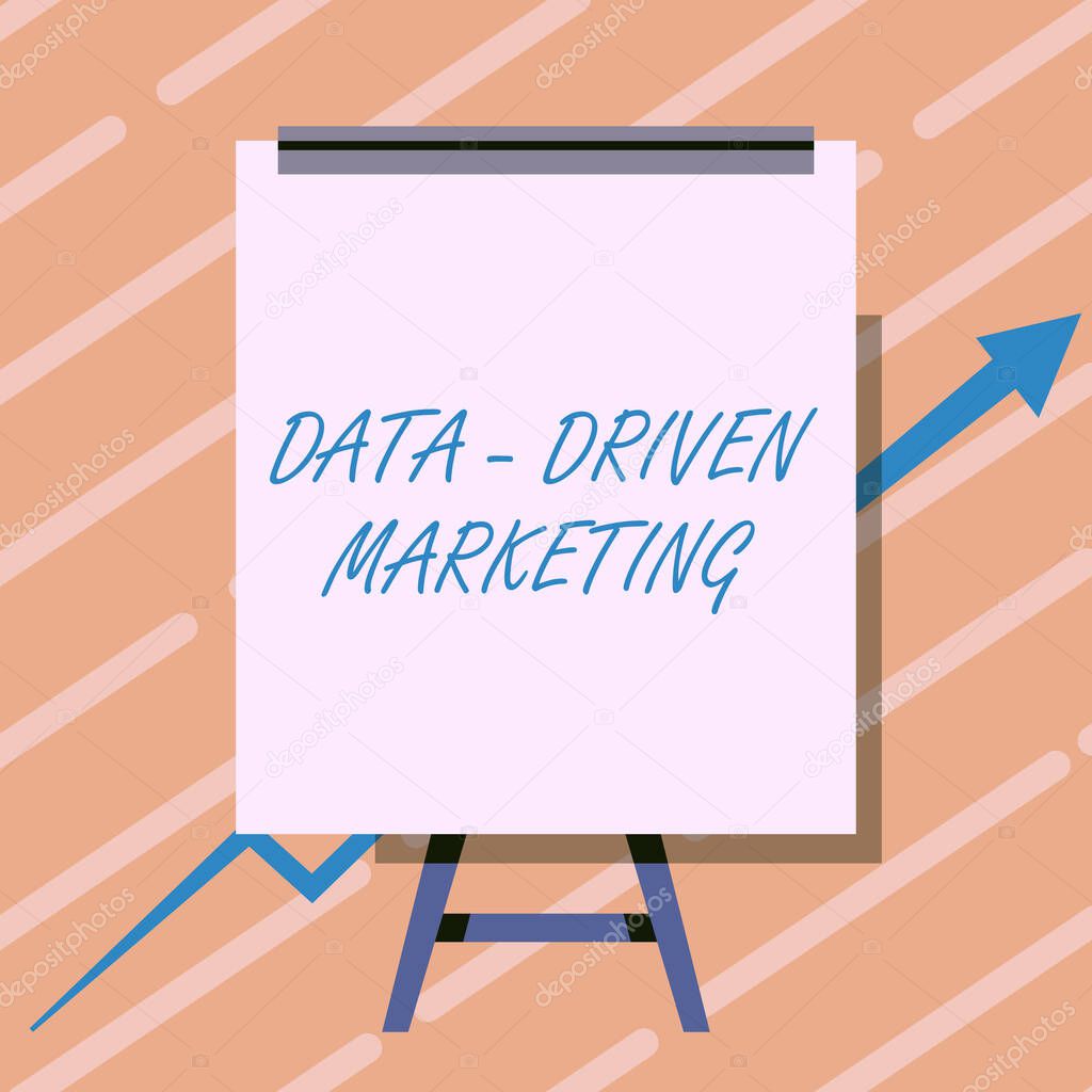 Hand writing sign Data Driven Marketing. Word for Strategy built on Insights Analysis from interactions Whiteboard Drawing With Arrow Going Up Presenting Growing Graph.