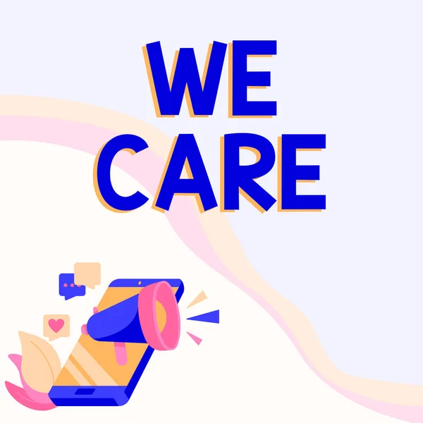 Szöveg megjelenítése We Care. Word for We Care telefon rajz megosztása Hozzászólások és reakciók keresztül Megafon. — Stock Fotó