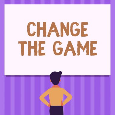 Oyunu Değiştir 'i gösteren metin işareti. Bir hareket üzerine yazılmış sözcük farklı yeni stratejiler yap Adam ayakta duran eller ve kalçalar boş bir tahtaya bakıyor.