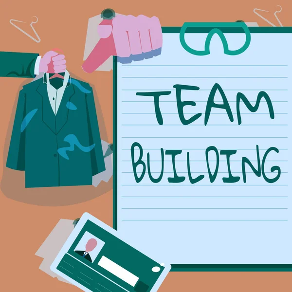 Panneau texte montrant Team Building. Mot pour Types d'activités utilisées pour améliorer les relations sociales Mains tenant Uniforme Affichage de nouvelles opportunités de carrière ouvertes. — Photo