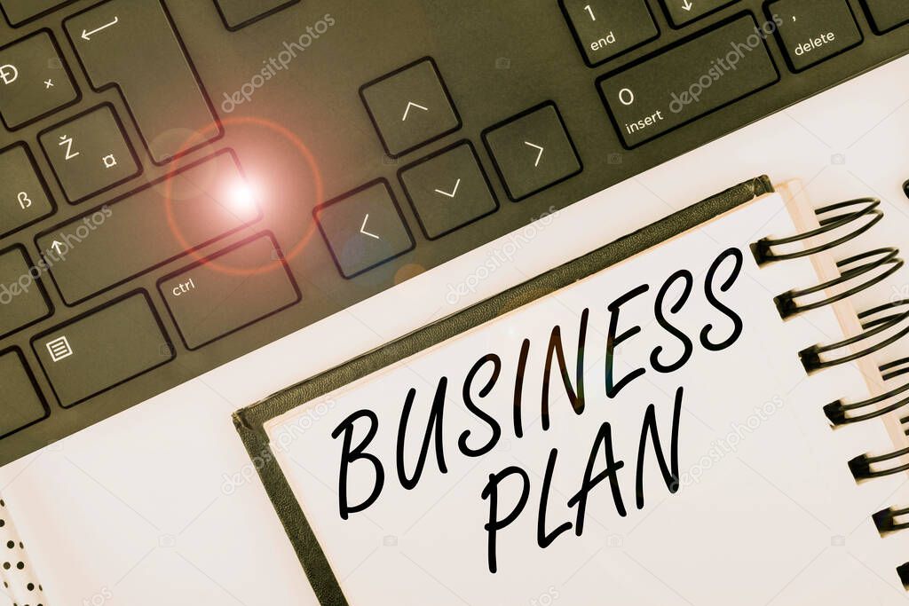 Handwriting text Business Plan. Word Written on Structural Strategy Goals and Objectives Financial Projections Computer Keyboard And Symbol.Information Medium For Communication.