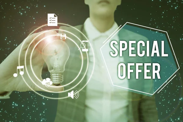 Handwriting text Special Offer. Business approach Selling at a lower or discounted price Bargain with Freebies Lady in suit holding light bulb representing innovative thinking. — ストック写真