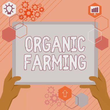 Organik çiftçiliği gösteren bir tabela. İş yaklaşımı, sürdürülebilirlik için uğraşan bütünleşik bir tarım sistemidir. Yeni İnanılmaz Fikirler için Büyük Tablet Arama Planları