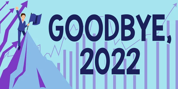Sign displaying Goodbye 2022. Concept meaning New Year Eve Milestone Last Month Celebration Transition Man Raising Hand To The Sky Standing On Top Hill Showing Success. — Stockfoto