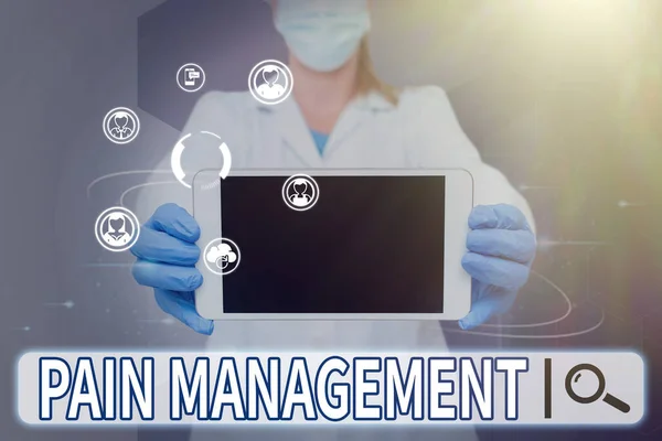 Writing displaying text Pain Management. Concept meaning a branch of medicine employing an interdisciplinary approach Nurse holding tablet symbolizing successful teamwork accomplishments. — Stock Photo, Image