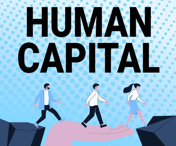 Conceptual caption Human Capital. Business approach Intangible Collective Resources Competence Capital Education Arrows Guiding Two Collaborating Colleagues Towards Better Financial Plan — стоковое фото