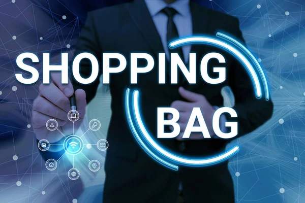 Conceptual display Shopping Bag. Business concept Containers for carrying personal possessions or purchases Man holding Screen Of Mobile Phone Showing The Futuristic Technology. — Foto de Stock