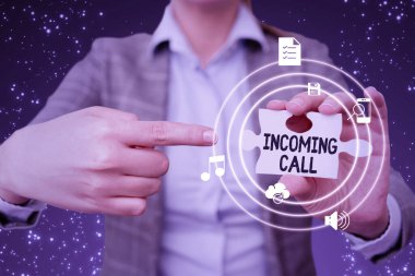Hand writing sign Incoming Call. Concept meaning Inbound Received Caller ID Telephone Voicemail Vidcall Lady in suit pointing puzzle piece representing innovative thinking.