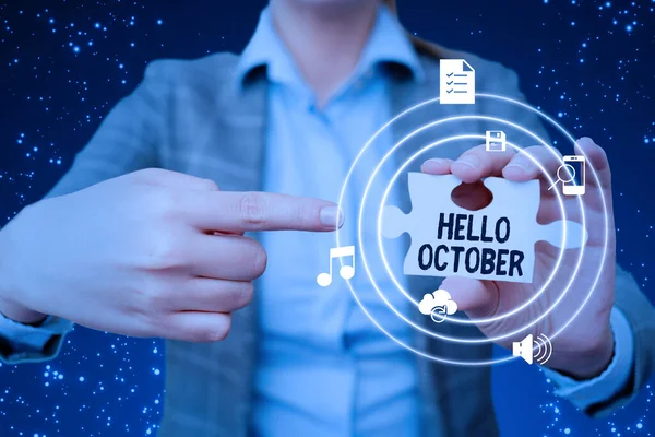 Text caption presenting Hello October. Business idea Last Quarter Tenth Month 30days Season Greeting Lady in suit pointing puzzle piece representing innovative thinking. — Stockfoto