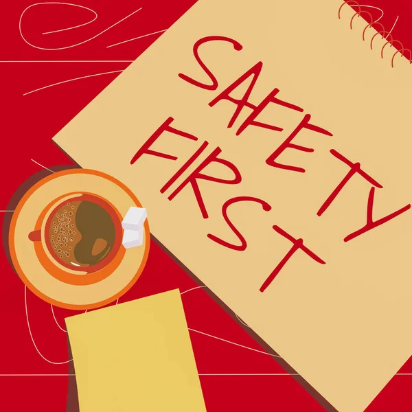 Text caption presenting Safety First. Concept meaning Avoid any unnecessary risk Live Safely Be Careful Pay attention offee cup sitting on desk with notebook representing relaxed working space. — ストック写真