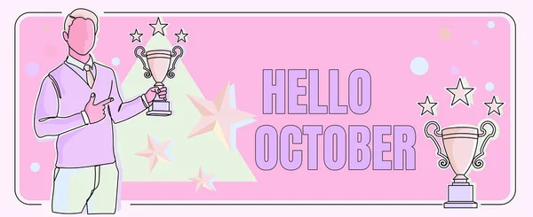 Sign displaying Hello October. Internet Concept Last Quarter Tenth Month 30days Season Greeting Man pointing finger holding trophy cheering reaching project success. — Stockfoto