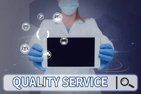 Writing displaying text Quality Service. Business concept how well delivered service conforms to clientexpectations Nurse holding tablet symbolizing successful teamwork accomplishments. — Stok fotoğraf