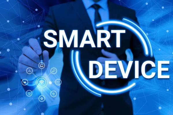 Text sign showing Smart Device. Business overview Electronic gadget that able to connect share interact with user Man holding Screen Of Mobile Phone Showing The Futuristic Technology. — Fotografia de Stock