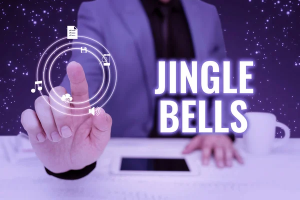 Натхнення, що показує знак Jingle Bells. Бізнес-концепція Найвідоміша традиційна різдвяна пісня по всьому світу Бізнесмен у костюмі, що вказує вгору, представляючи інноваційне мислення . — стокове фото