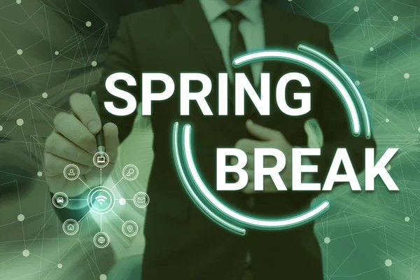 Text caption presenting Spring Break. Business overview Vacation period at school and universities during spring Man holding Screen Of Mobile Phone Showing The Futuristic Technology.