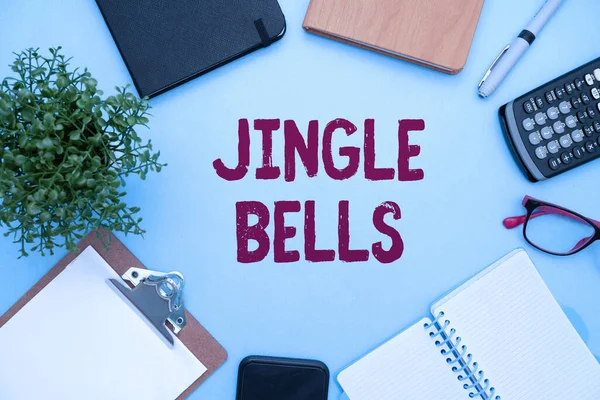 Text caption presenting Jingle Bells. Conceptual photo Most famous traditional Christmas song all over the world Flashy School Office Supplies, Teaching Learning Collections, Writing Tools, — Stok fotoğraf