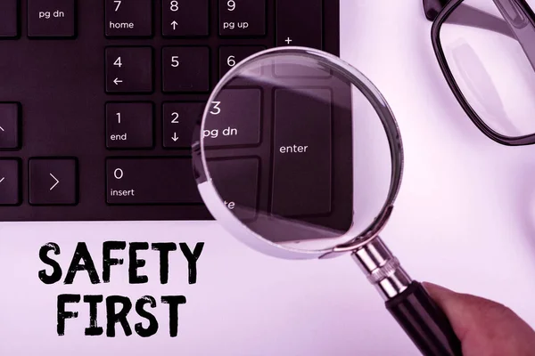 Text caption presenting Safety First. Word Written on Avoid any unnecessary risk Live Safely Be Careful Pay attention Computer Keyboard And Symbol.Information Medium For Communication. — Stockfoto