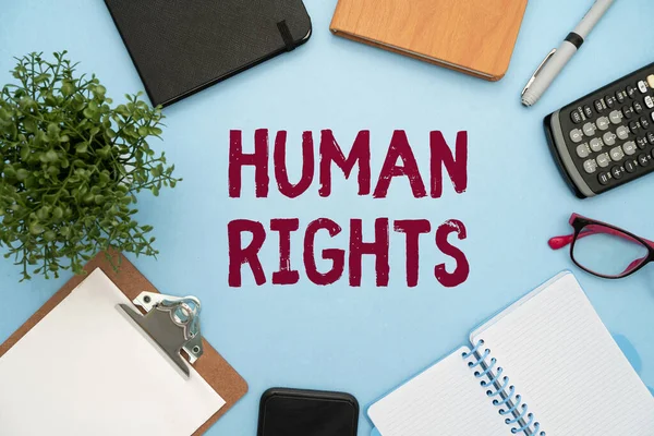 Text sign showing Human Rights. Business idea Moral Principles Standards Norms of a showing protected by Law Flashy School Office Supplies, Teaching Learning Collections, Writing Tools, — Fotografia de Stock