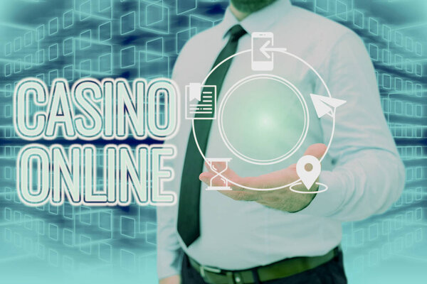Text caption presenting Casino Online. Business overview Computer Poker Game Gamble Royal Bet Lotto High Stakes Businessman in suit holding open palm symbolizing successful teamwork.