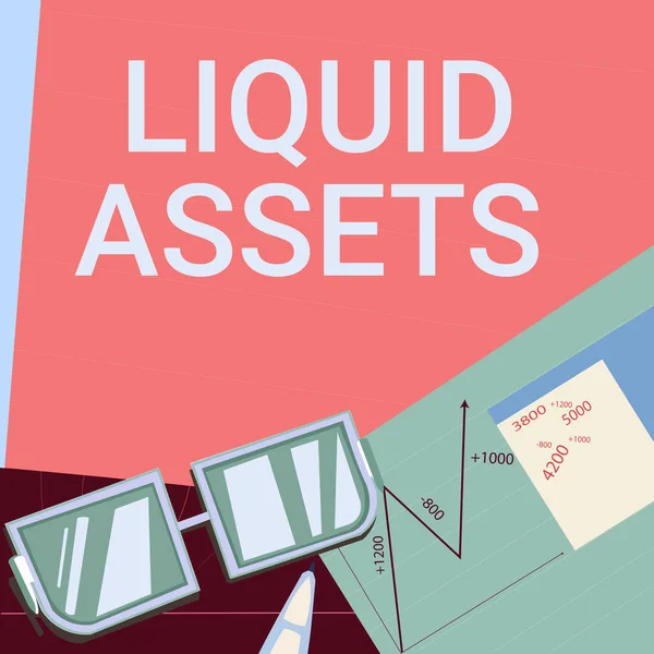 Hand writing sign Liquid Assets. Business overview Cash and Bank Balances Market Liquidity Deferred Stock Paper sitting on desk consisting charts calculation financial plans. — 스톡 사진