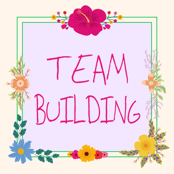 Handwriting text Team Building. Word for Types of activities used to enhance social relations Frame Decorated With Colorful Flowers And Foliage Arranged Harmoniously. — Fotografia de Stock