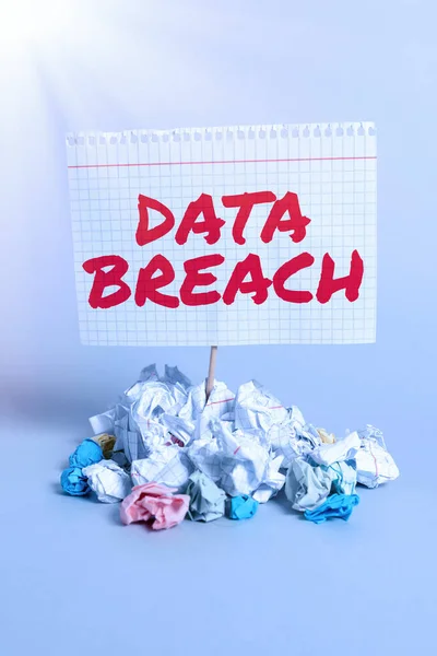 Hand writing sign Data Breach, Concept meaning security incident where sensitive protected information copied -47242