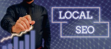 Konsept görüntü Local Seo, İş görüşü. Bu, işinizi online pazarlamanın etkili bir yoludur. Takım elbiseli bayan elinde kalem tutarak başarılı takım çalışmalarını sembolize eder..