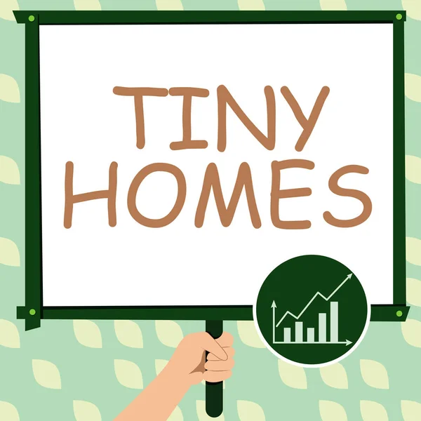 Conceptual display Tiny Homes, Concept meaning houses contain one room only or two and small entrance Cheap Hand Holding Panel Board Displaying Latest Financial Growth Strategies.